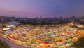 Arial view multiple colours night flea market roof to