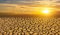 Arid Clay soil Sun desert global worming concept cracked scorched earth soil drought desert landscape dramatic sunset