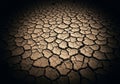 Arid, cracked earth forms a pattern of irregular polygons, typical of a dried-out Royalty Free Stock Photo