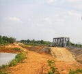 The arid ground has an iron bridge, a railway crossing in Thailand in the summer. Royalty Free Stock Photo