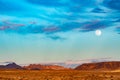 Arid mojave desert full moon landscape Nevada USA Royalty Free Stock Photo