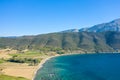 The arid rocky coast and its green countryside, in Europe, in Greece, in Aetolia Acarnania, towards Patras, by the Ionian Sea, in Royalty Free Stock Photo