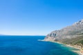 The arid rocky coast and its green countryside, in Europe, in Greece, in Aetolia Acarnania, towards Patras, by the Ionian Sea, in Royalty Free Stock Photo