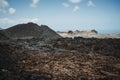 Arid volcanic landscape with lava fields in Timanfaya National Park, Lanzarote, Canary Island, Spain Royalty Free Stock Photo