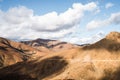 Arid volcanic mountain landscape on Fuerteventura Island Royalty Free Stock Photo