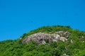 Tropical granite rock hill with clear sky Royalty Free Stock Photo