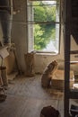 Ariege, France, 2015. Traditional artisan wooden flour mill feeding flour bags