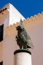 Aries with a flag on a column, Ciutatella de Menorca center Royalty Free Stock Photo