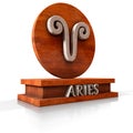 Aries zodiac sign. 3D illustration of the zodiac sign Aries made of stone on a wooden stand with the name of the sign at the base. Royalty Free Stock Photo