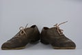 Women`s unusual gray brown shoes, shoes from genuine leather in the English style.