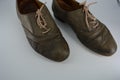Women`s unusual gray brown shoes, shoes from genuine leather in the English style.