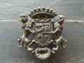 Aristocratic coat of arms on antique door