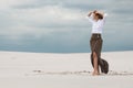 Aristocratic girl in a long skirt in the desert