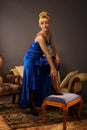 Aristocratic lady in a dark blue dress