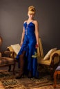 Aristocratic lady in a dark blue dress