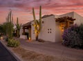 Arizona resort with cactus and sunset Royalty Free Stock Photo