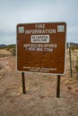 ARIZONA, USA - DECEMBER 02, 2019: bullet-riddled information sign FIRE INFORMATION in Arizona, PHOENIX