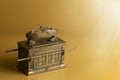 Ark of the Covenant on a Dramatic Gold Background Royalty Free Stock Photo