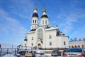 Arkhangelsk, Russia, February, 20, 2018. Cars near the church of the Assumption of the mother of God Uspenskaya church in Arkhan