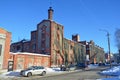 Arkhangelsk, Russia, February, 20, 2018. Cars near monument of urban planning and architecture - the main building of the brewery