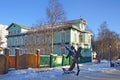 Arkhangelsk, Russia, February, 20, 2018. People walking near the house of Chudinov, built in 1904 year on avenue of Chumbarov-Luch Royalty Free Stock Photo