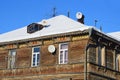 Arkhangelsk, Russia, February, 20, 2018. TV antennas on the roof of an old wooden mansion on Chumbarov-Luchinsky Avenue Royalty Free Stock Photo