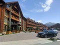 Arkhyz, Karachay-Cherkessia, Russia - August 21, 2022: View of the hotel in the format of a wooden chalet in the Arkhyz resort