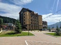 Arkhyz, Karachay-Cherkessia, Russia - August 21, 2022: View of a hotel in the resort area of Arkhyz against the backdrop of the