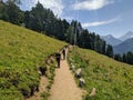 Arkhyz, Karachay-Cherkessia, Russia - August 21, 2022: View of the trail of romantics and the Caucasian mountains in the resort