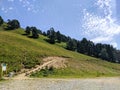 Arkhyz, Karachay-Cherkessia, Russia - August 21, 2022: View of the trail of romantics in the resort area of Arkhyz. People are