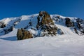 Arktic . Cliffs protruding from the snow. Royalty Free Stock Photo