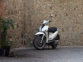 ARKUA PETRARKA, ITALY - AUGUST 13, 2019: motorcycle on the pavement of the old city