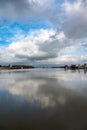 Arles, Provence, France, View over the River Rhone and the banks of the village with historical buildings Royalty Free Stock Photo