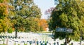 Arlington National Cemetery signs to gravesite of J F Kennedy and Tomb of unkown Soldier at historic graveyard of national