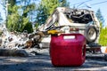 Burned out RV Motorhome on Jorden Road: Gas Can in Focus in foreground Royalty Free Stock Photo