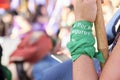 Arm with a green handkerchief. Rally in support of the legal abortion law