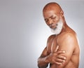 Arm pain, injury and senior black man with muscle inflammation, body accident and broken bone on studio background Royalty Free Stock Photo