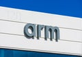 Arm sign and logo on the facade of British multinational semiconductor and software design company Royalty Free Stock Photo