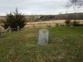 Arm of Stonewall Jackson grave and stone in grass