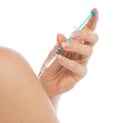 Arm subcutaneous insulin syringe injection vaccination Royalty Free Stock Photo