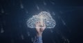 Arm wearing light blue shirt touching holographic cloud brain in interface, with binary digits Royalty Free Stock Photo