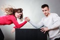 Arm wrestling challenge between young couple Royalty Free Stock Photo