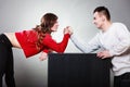 Arm wrestling challenge between young couple Royalty Free Stock Photo