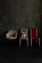 Armchair chair grey red on black background in room interior furniture Royalty Free Stock Photo