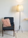 Armchair and lamp in minimal interior