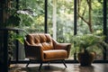 Armchair near window with view on summer park