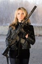 Armed beautiful young woman Royalty Free Stock Photo