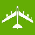 Armed fighter jet icon green