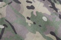 Armed force multicam camouflage fabric texture piece background Royalty Free Stock Photo