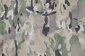 Armed force multicam camouflage fabric texture piece background Royalty Free Stock Photo